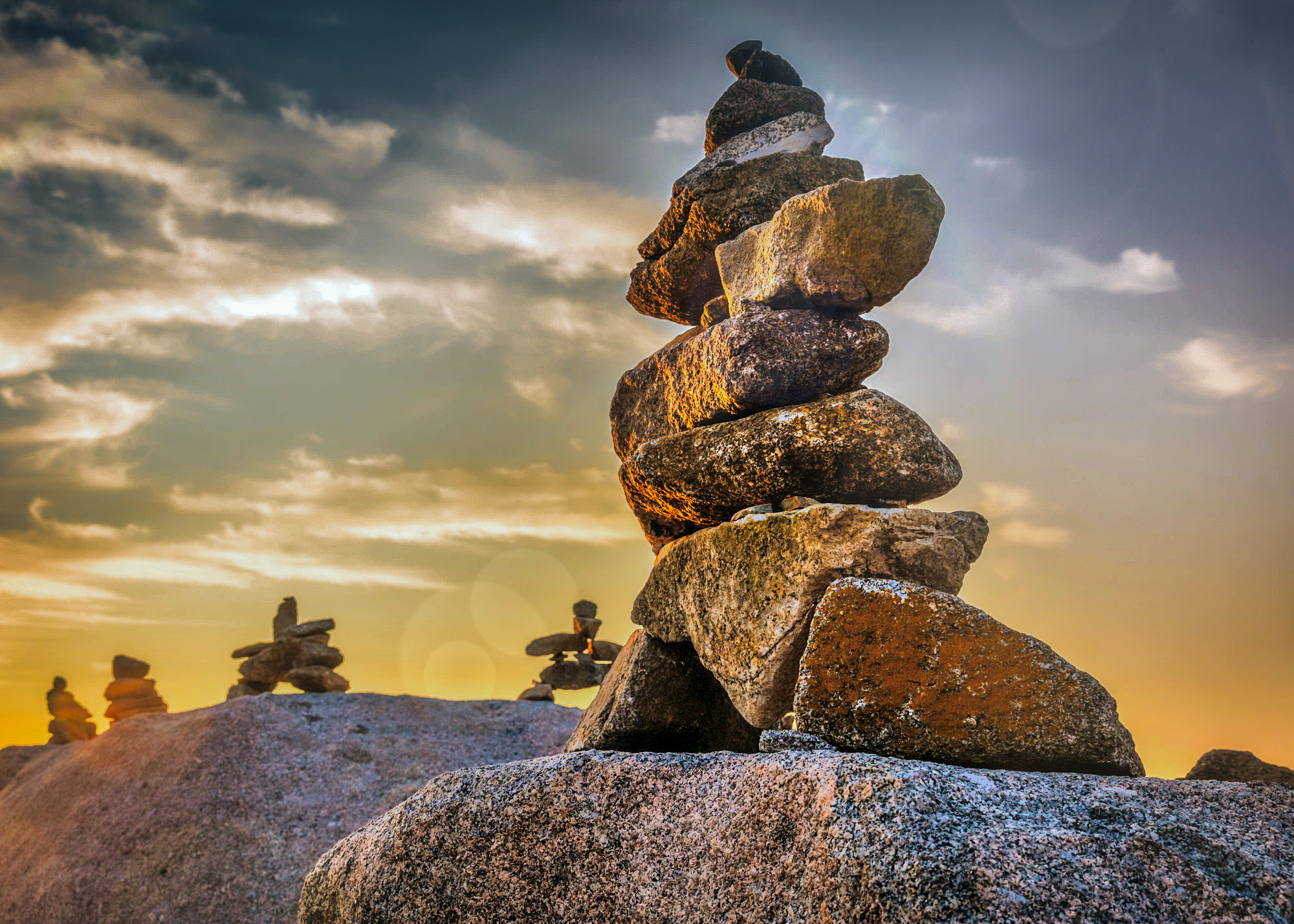 PH5VE training, workshops and conference speaking - Building meaning. A foundation that holds up any ambition. Above and beyond (Inuksuk Canada Peggy Cove)